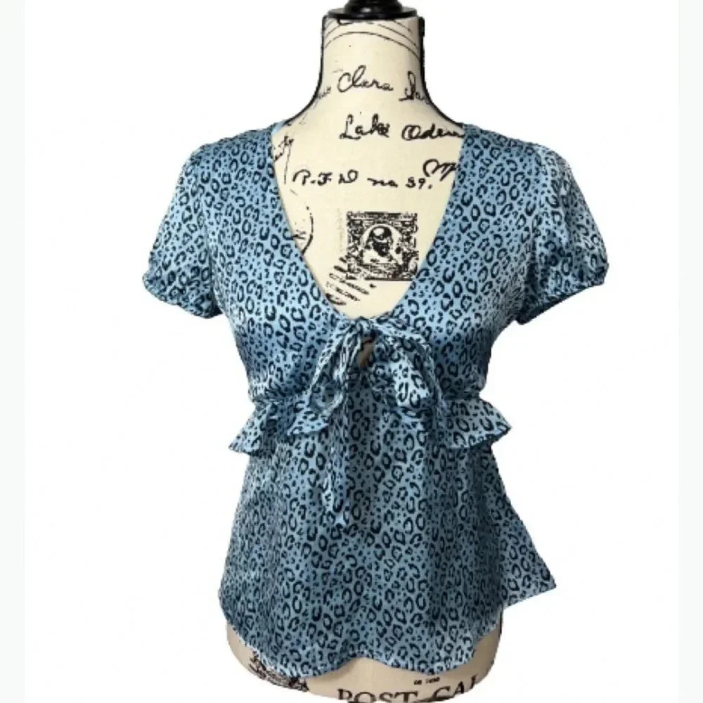 Francesca’s collection BLUE & BLACK ANIMAL PRINT CAP SLEEVE BLOUSE. NWT SIZE MED